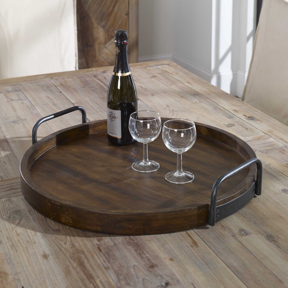 Farmhouse-style serving tray made of acacia wood with a natural finish, featuring sturdy black iron handles for a rustic yet elegant touch.