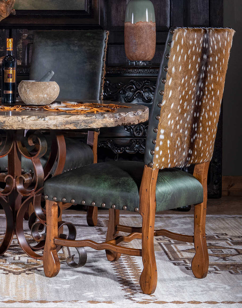 Forest Green Saguaro Leather Dining Chair, showcasing its dark green hand-burnished leather seat and backrest.