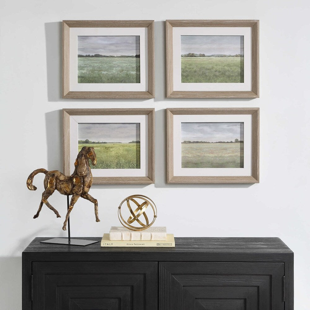 Set of 4 seasonal landscape prints by Paul Duncan, framed with natural linen liners and light whitewashed pine wood frames.