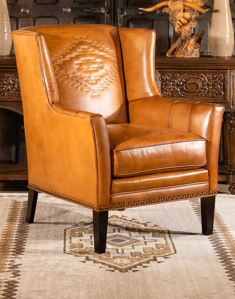 Angled view of the French Leather Chair, emphasizing its rugged panache and southwestern style.