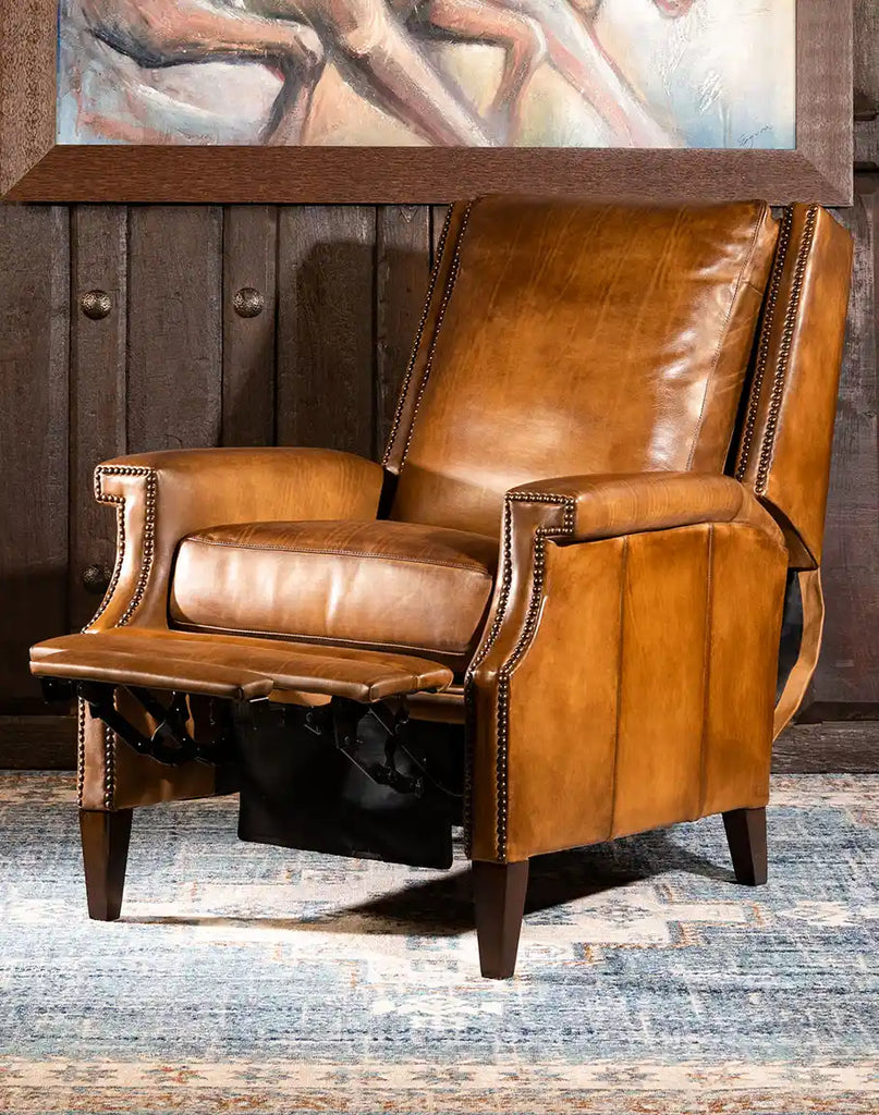 The Gents Saddle Leather Recliner in a fully reclined position, displaying its smooth reclining mechanism and premium leather upholstery.