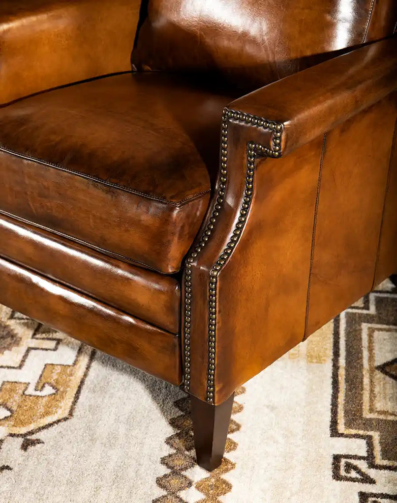 A close-up of the plush cushioned seat on the Gents Tan Leather Recliner, highlighting its premium comfort and support.