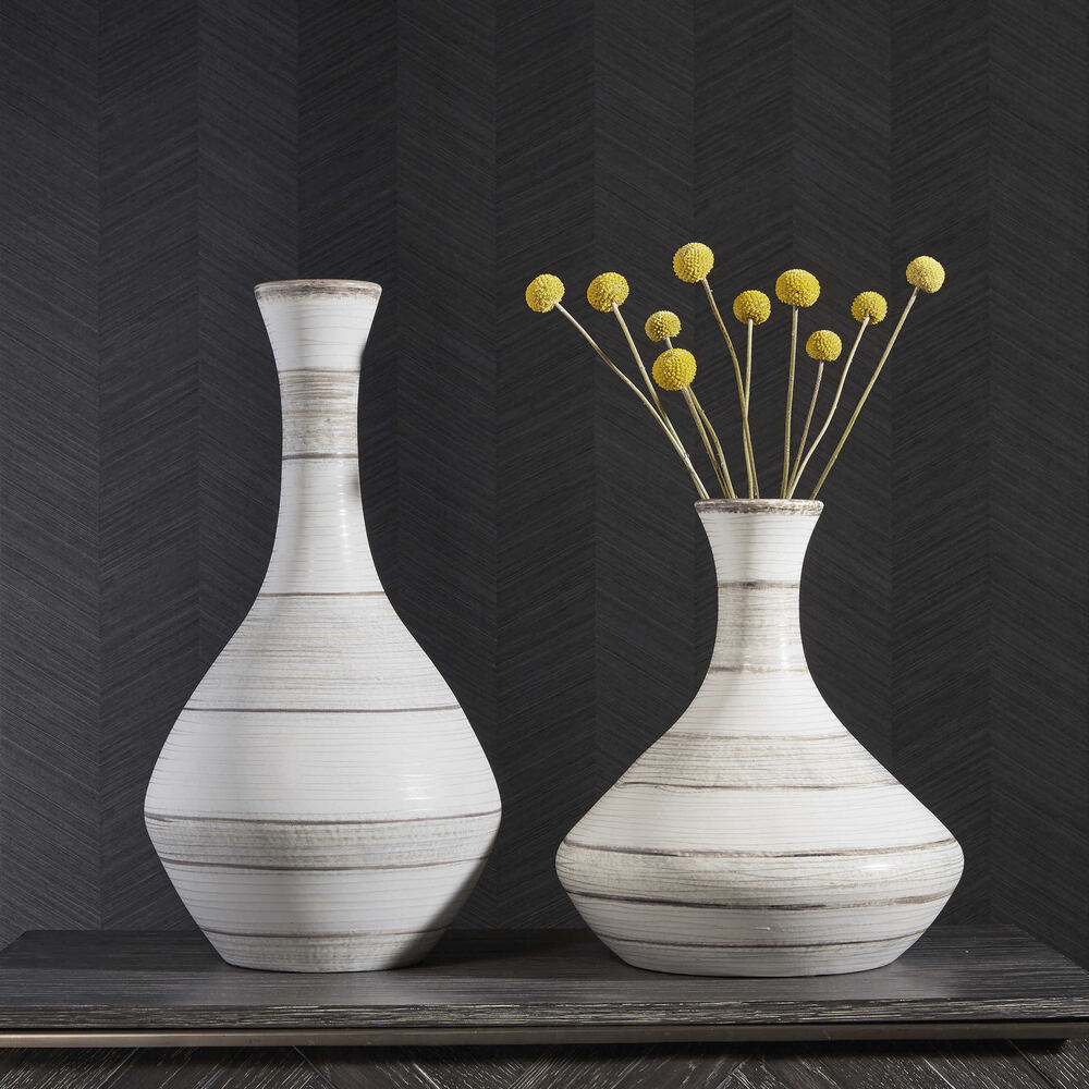 Handcrafted ceramic Potter vases with striped glaze in ivory, blue, and tan, available in small and large sizes.