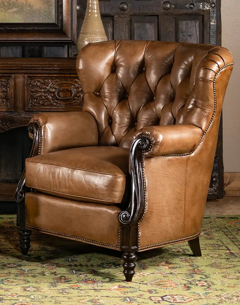 Front-facing image showcasing the full design of the Hector Tufted Leather Chair, highlighting its hand-burnished leather and intricate studding details.