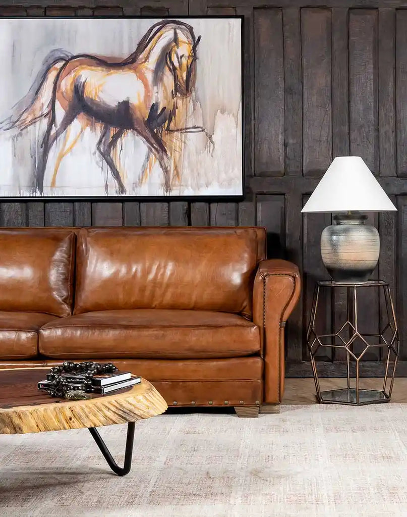 Herdsman Western Leather Sofa placed in a rustic living room, complementing the mountain ranch decor.