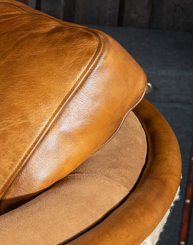 Close-up of the hand-burnished leather highlighting the exquisite craftsmanship.