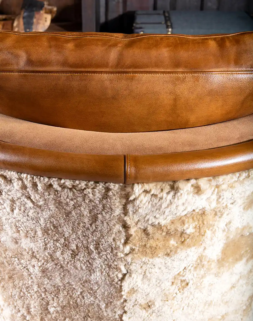 Detailed view of the upholstery-grade shearling hide providing a luxurious touch to the chair's exterior.