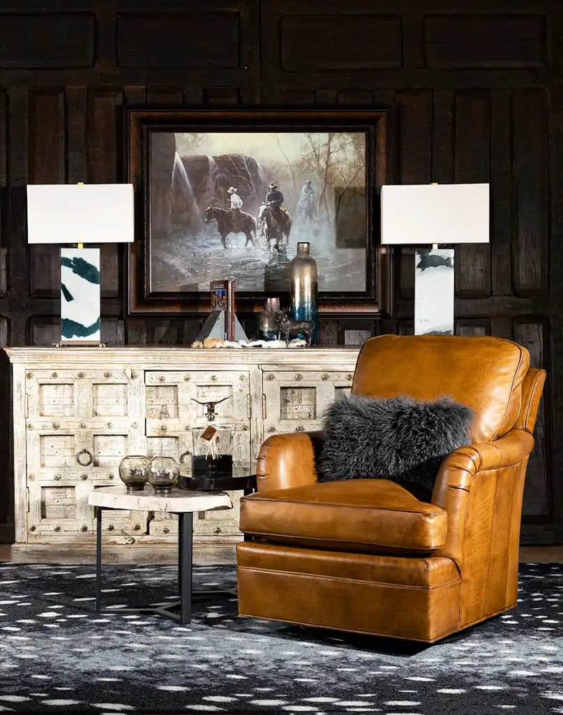 Hulton Swivel Glide Chair styled in a rustic living room setting, blending comfort and timeless charm.