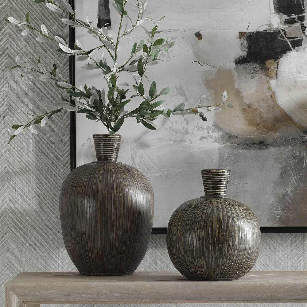 Isla Terra Cotta vases in two sizes, showcasing bamboo stripes and a sophisticated black washed finish.