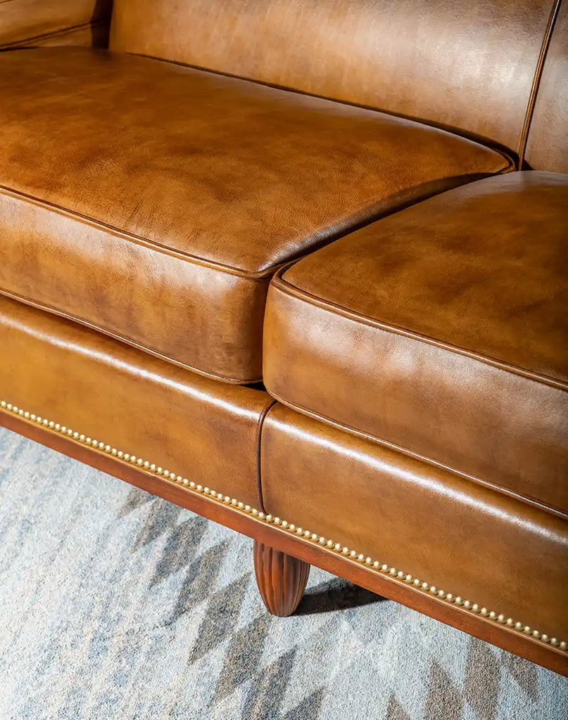 Detailed view of the Jaxon Leather Sofa's seat cushion emphasizing comfort and quality materials.