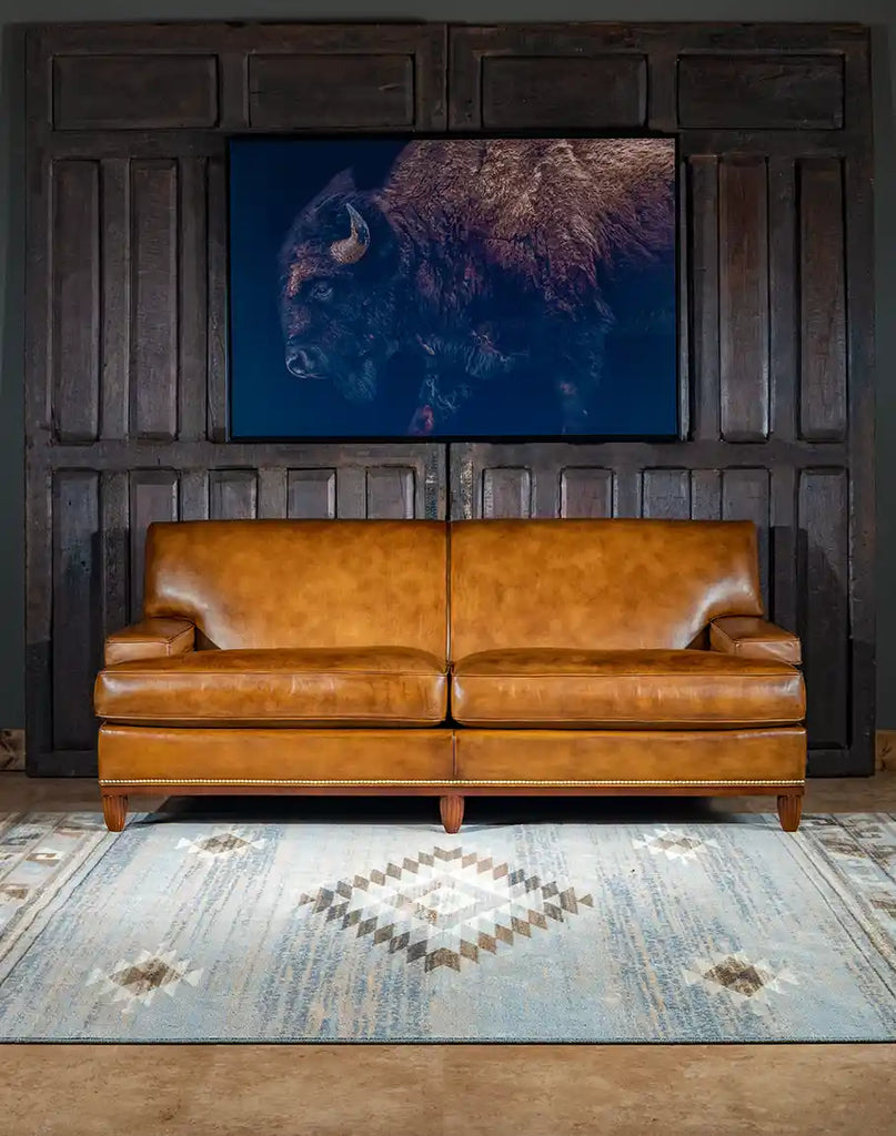 Jaxon Leather Sofa showcasing its full-grain leather upholstery and classic design.