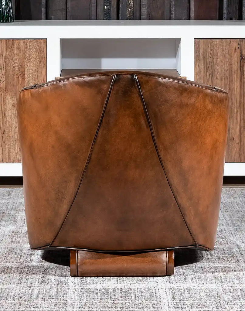 Back view of the Johnson Leather Chair, displaying the seamless leather craftsmanship and smooth, rounded design.