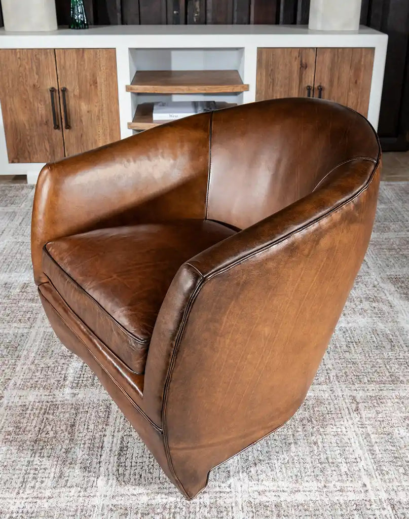 Top-down view of the Johnson Leather Chair, illustrating its curved seat and smooth leather finish.