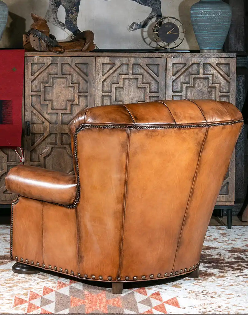 A back view of the King Arthur Tufted Chair showcasing its deep button tufts and refined craftsmanship.