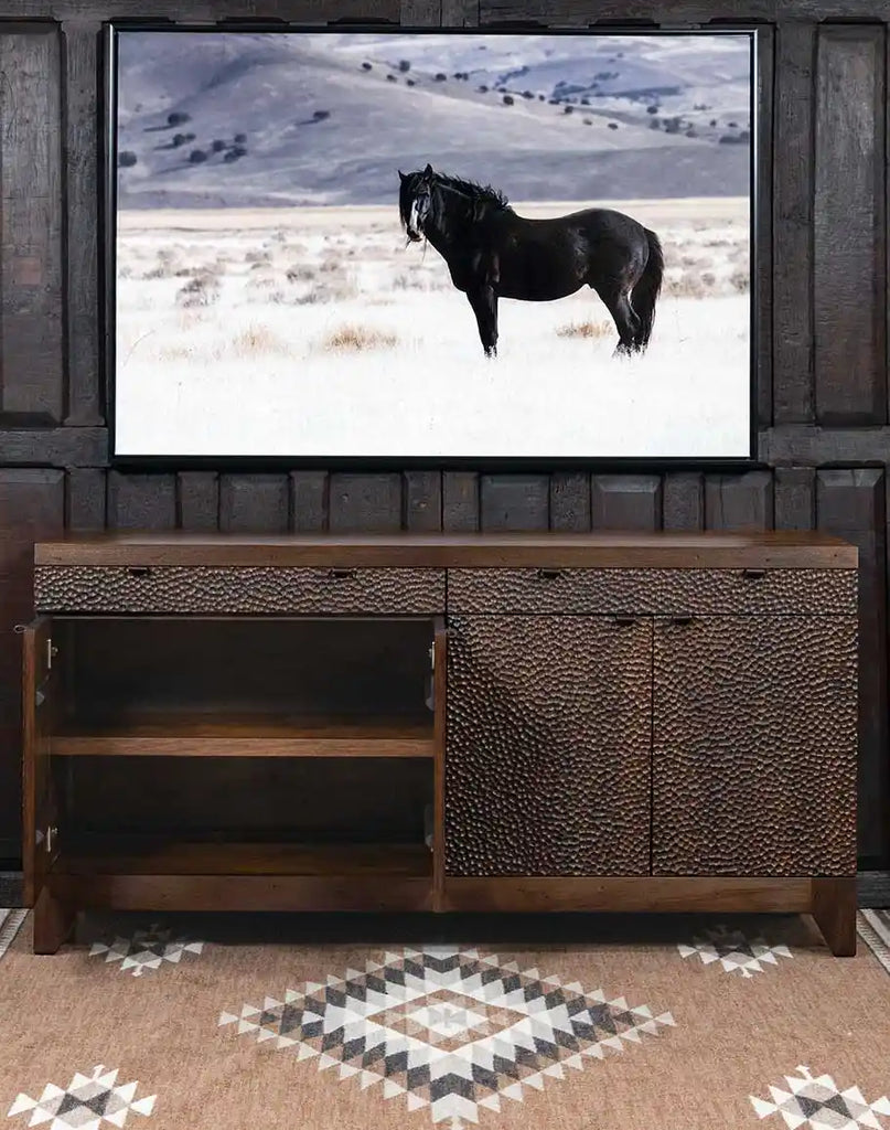 One cabinet of the La Flor Dominicana Buffet shown open, revealing spacious interior storage with shelves for dinnerware or linens.