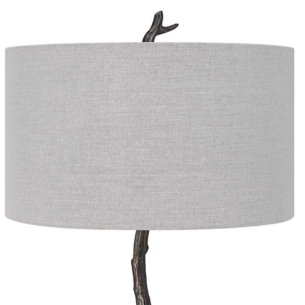 Modern rustic floor lamp with a nature-inspired cast iron base and an elegant light gray linen shade for a timeless look.