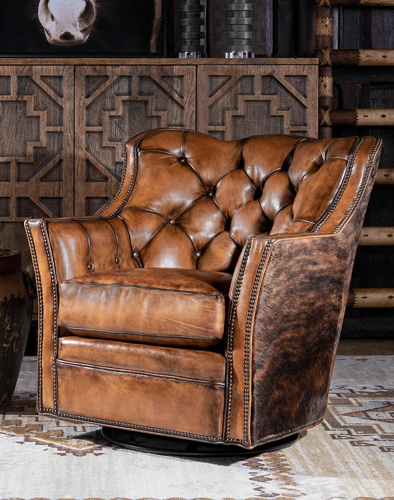 Medina Brindle Swivel Glider showcasing its deep button tufting and premium full-grain leather seat.