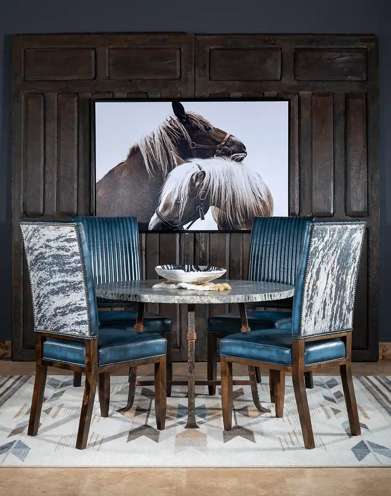 The Midnight Hue Dining Chair placed at a dining table, showcasing its integration into a dining room environment.