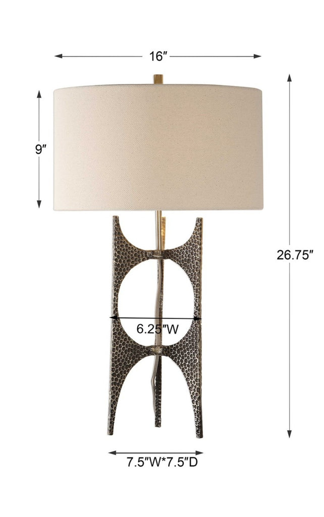 Elegant golden bronze table lamp with a hammered cast iron base and white linen drum shade, adding sophistication to any room.