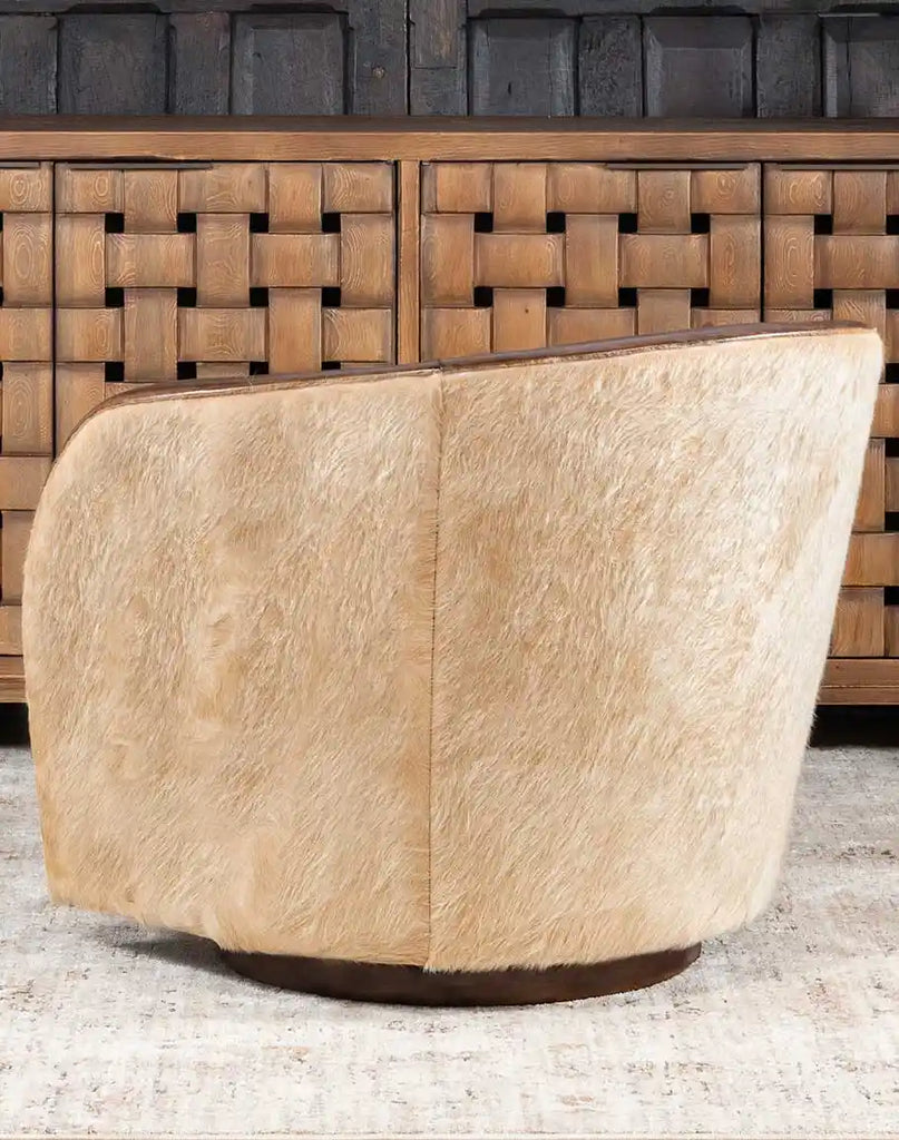 A detailed shot of the sturdy swivel base on the Moscow Mocha Swivel Chair, allowing for smooth 360-degree movement.