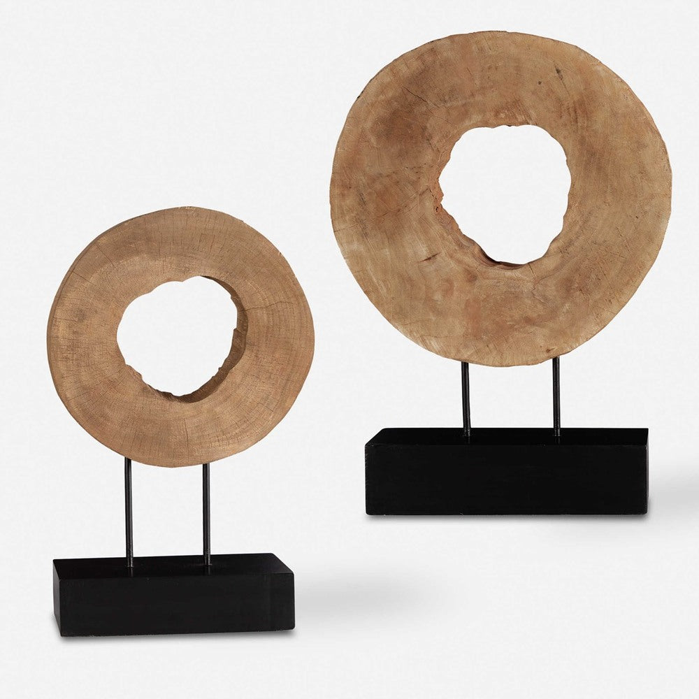 Natural mango wood log sculptures on sturdy black metal bases, perfect for rustic decor.