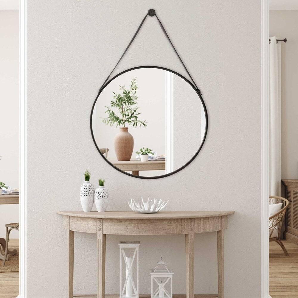 Nordic Circular Hanging Mirror with a 30" antique bronze frame, faux leather straps, and a decorative hook.