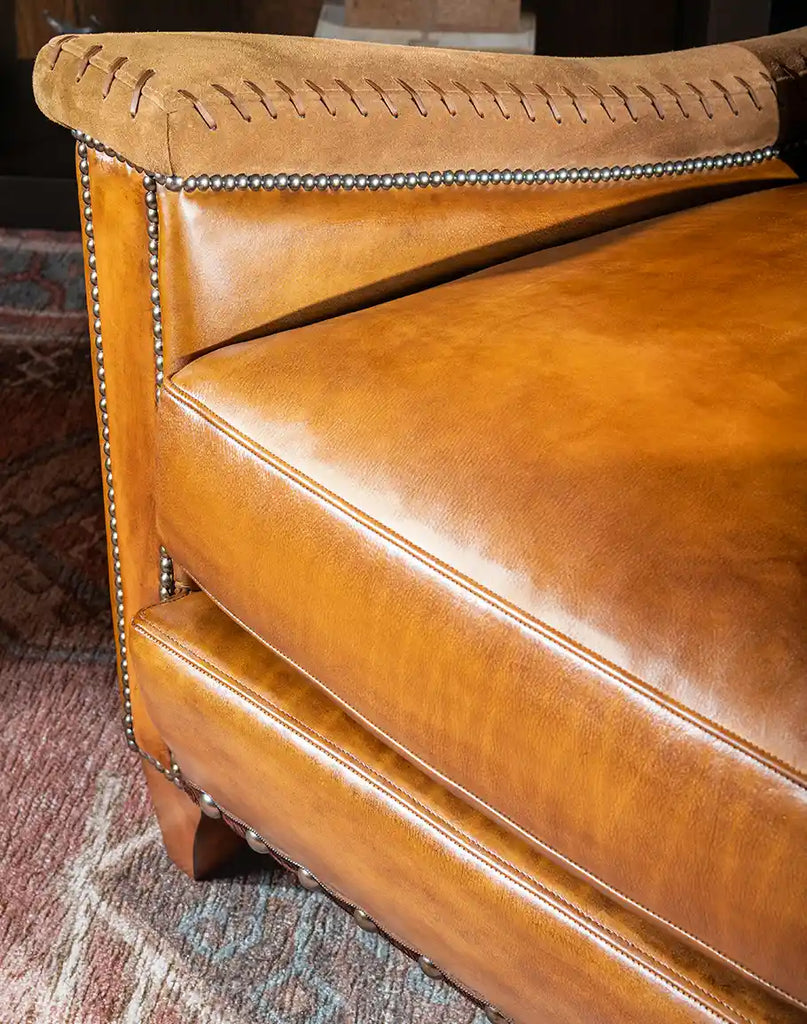 Overhead shot of the Norseman Leather Chair, showcasing its deep, comfortable cushioned seat in premium leather.