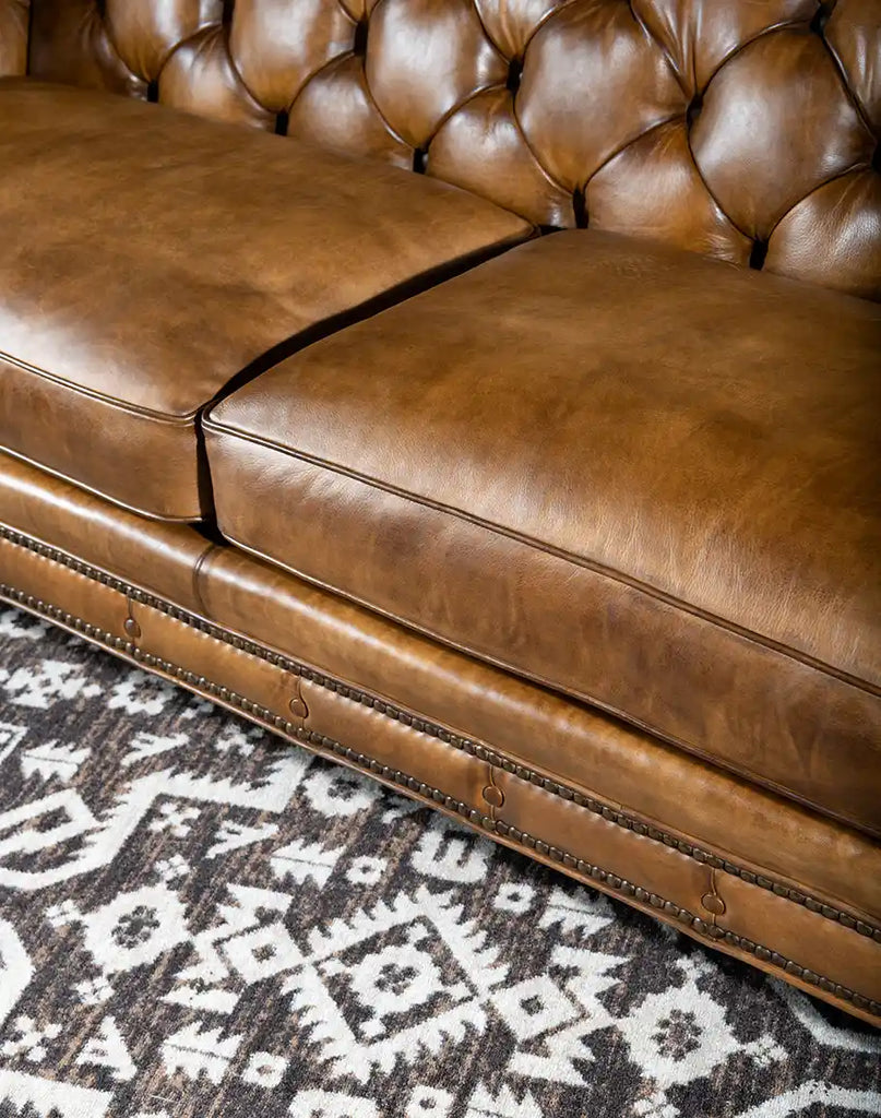 A view showcasing the plush seat cushions of the Nova Chesterfield Sofa for ultimate comfort.