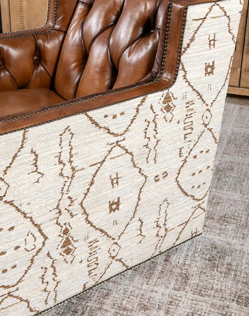 Close-up of the contrasting patterned fabric on the Oceanside Swivel Chair, showcasing its intricate design.