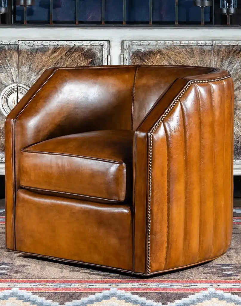 Olivia Leather Swivel Chair in natural lighting showcasing its rich full-grain leather and sleek design.