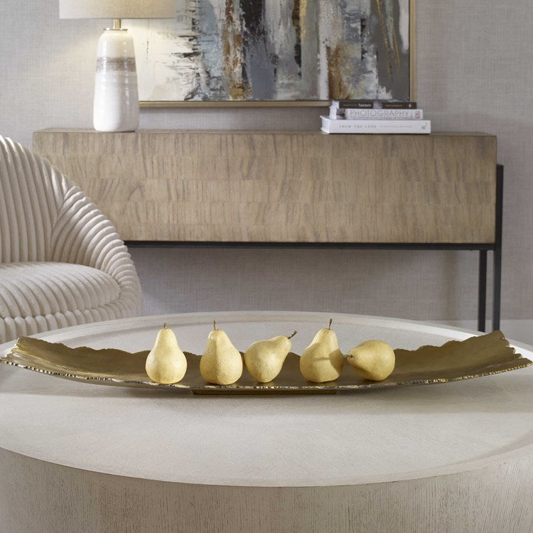 Ophelia Gold Tray styled on a console table with decorative accents.