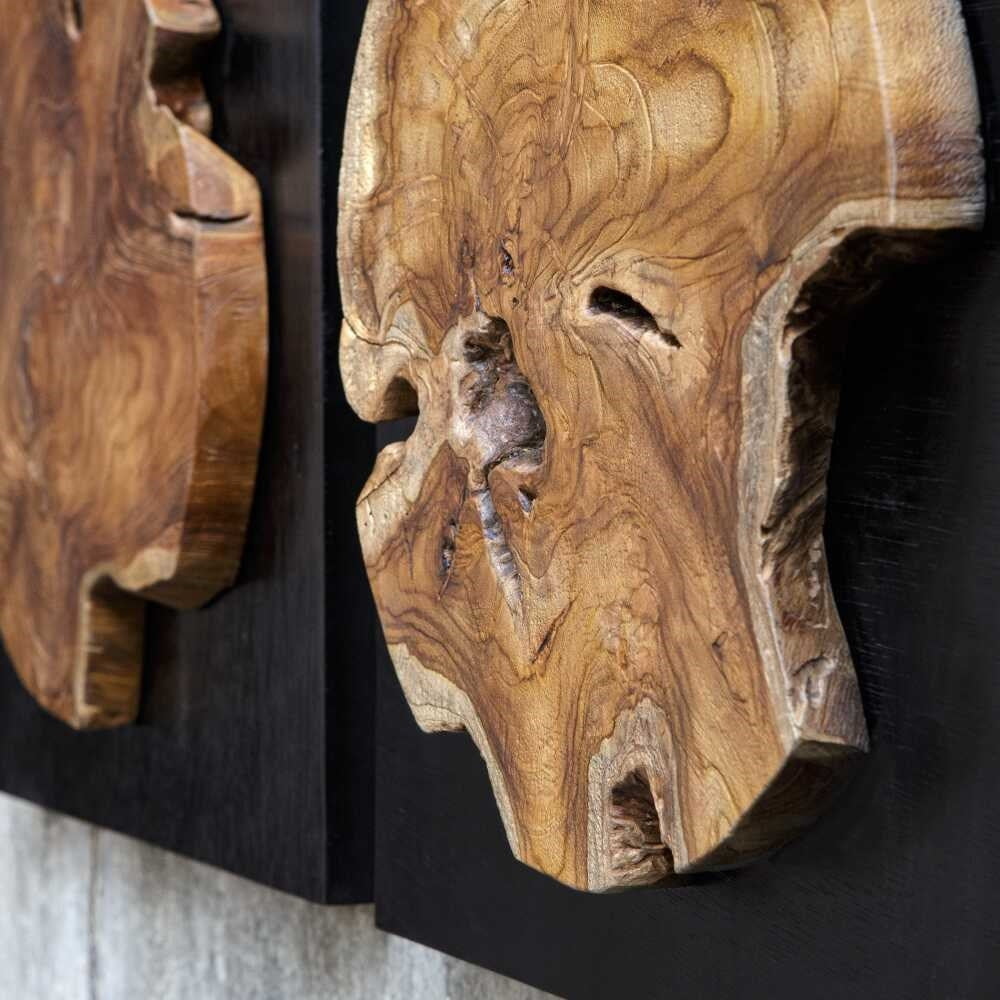 Decorative panels made from satin black wood with teak accents, highlighting unique organic textures.