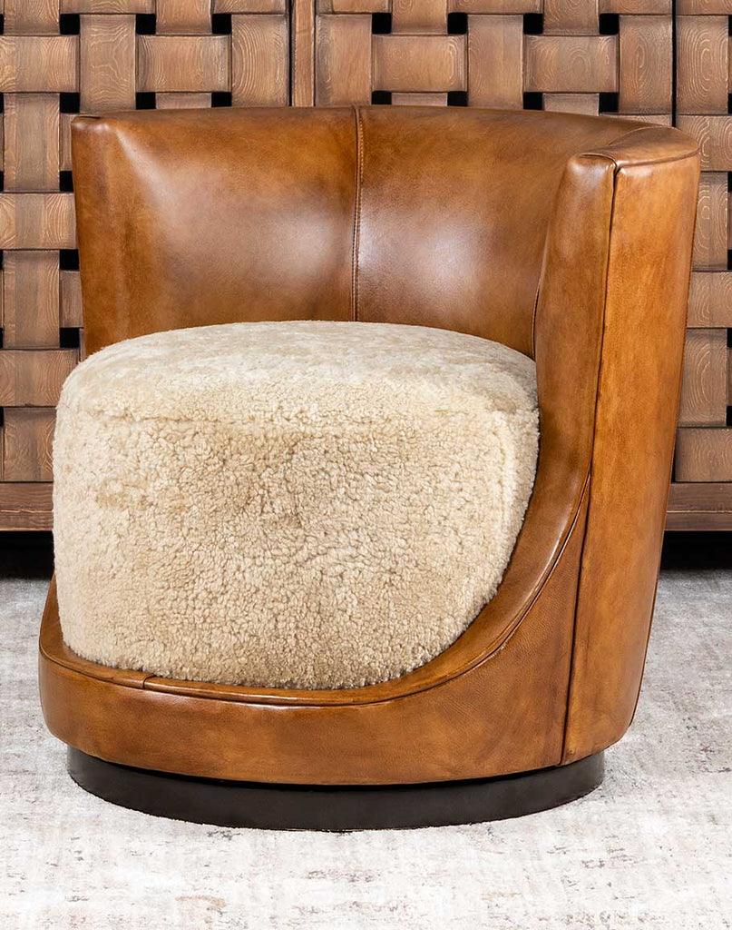 Pablo Swivel Chair showcasing its authentic grade A shearling and full-grain antiqued leather upholstery.