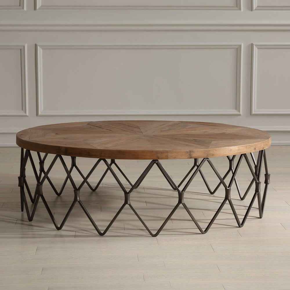 Rustic coffee table crafted from reclaimed wood with a parquet top and a robust iron chain link base in an aged finish.