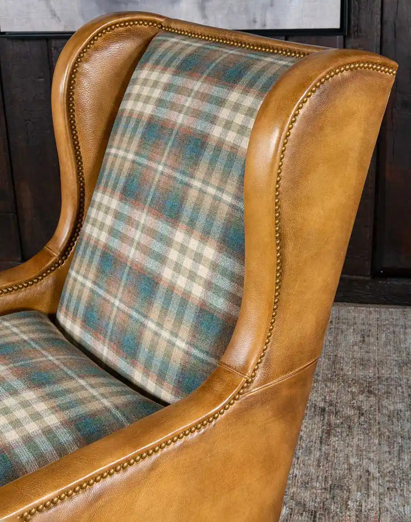 Close-up view of the plaid wool seat and backrest of the Patterned Spruce Chair, showing intricate detailing and refined texture.