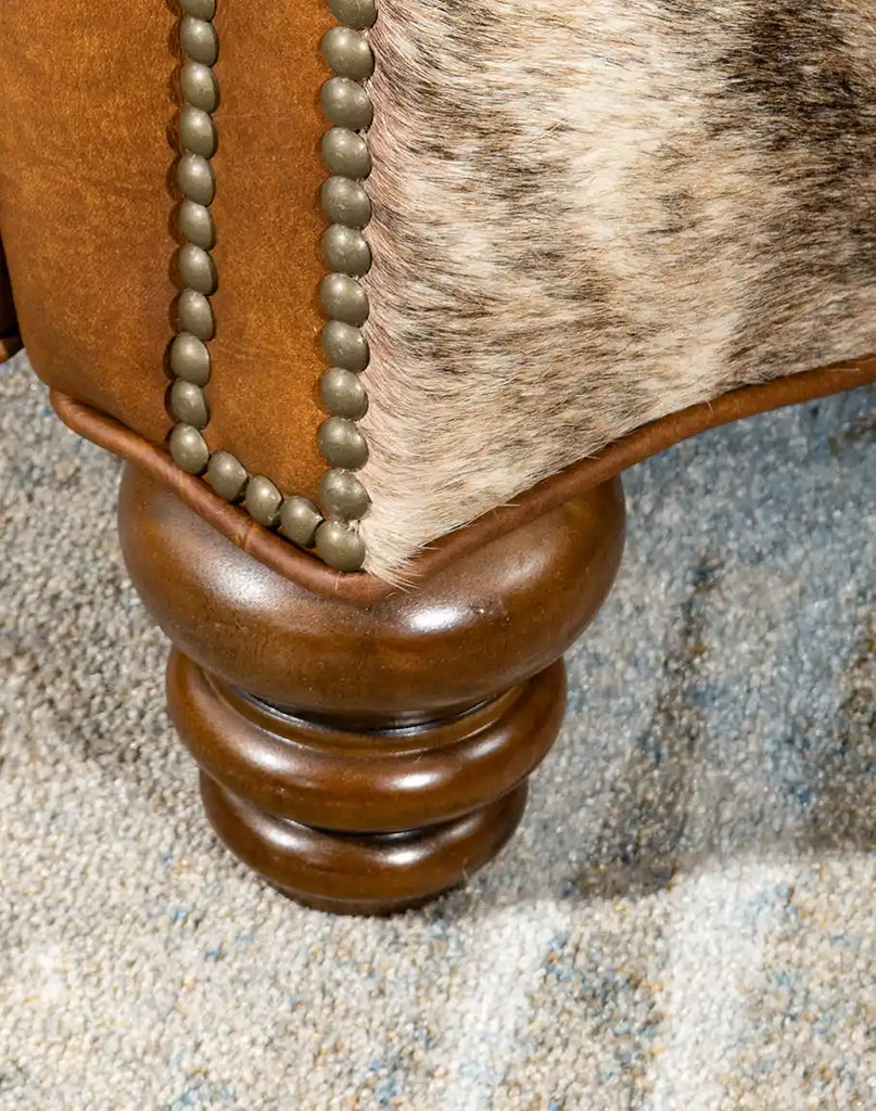 Close-up of the sturdy and stylish leg design on the Rancher Brindle Recliner, complementing its Western aesthetic.