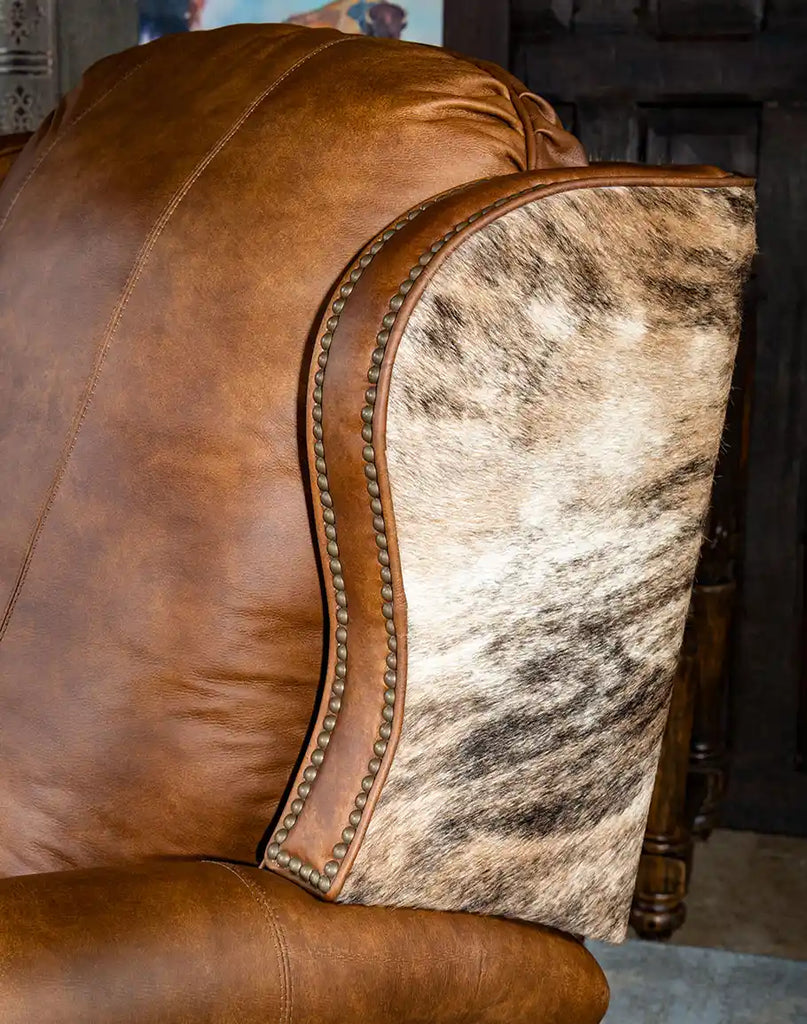 Detailed view of the nail head trim accentuating the classic Western style of the Rancher Brindle Recliner.