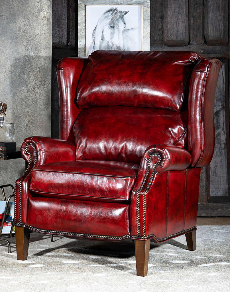 Raspberry Leather Recliner showcasing its full-grain dark red leather upholstery and classic design.