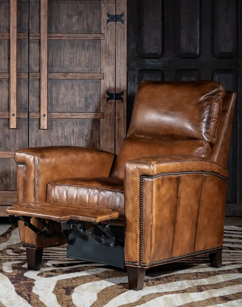 Revolt Bourbon Leather Recliner in a fully reclined position, demonstrating its comfort and functionality.