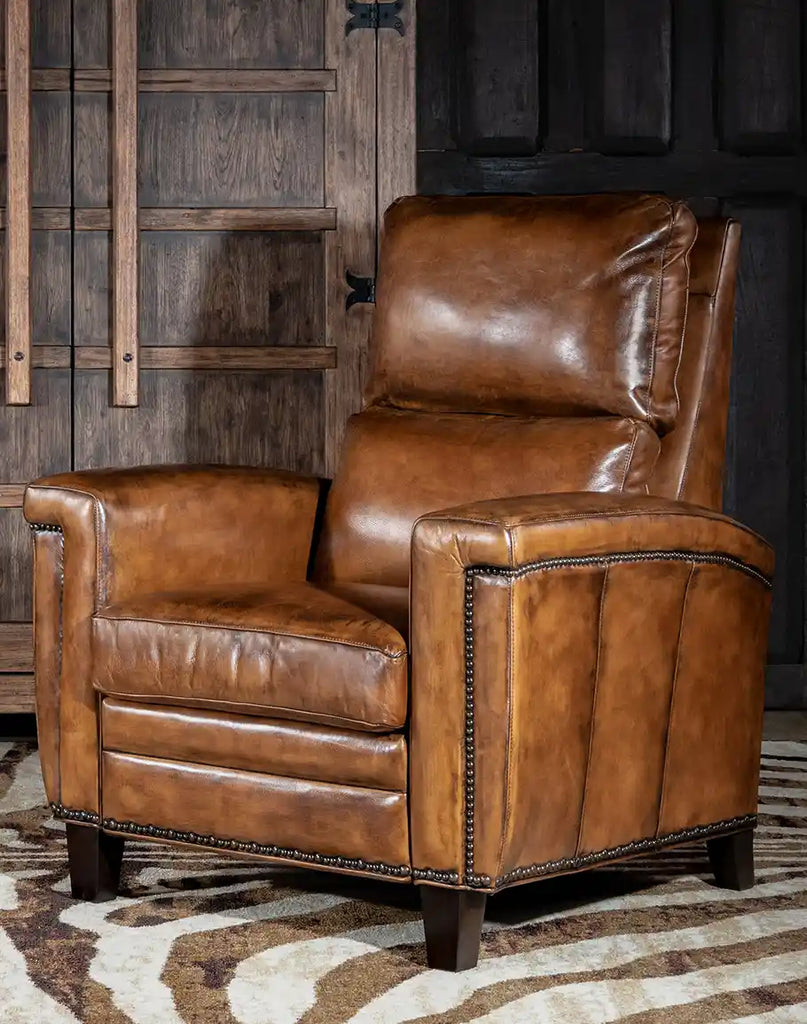 Revolt Bourbon Leather Recliner, showcasing its sleek design and full-grain leather upholstery.