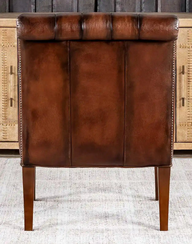 Back view of the Roan Sable Tufted Leather Chair, displaying its clean leather finish and timeless design.