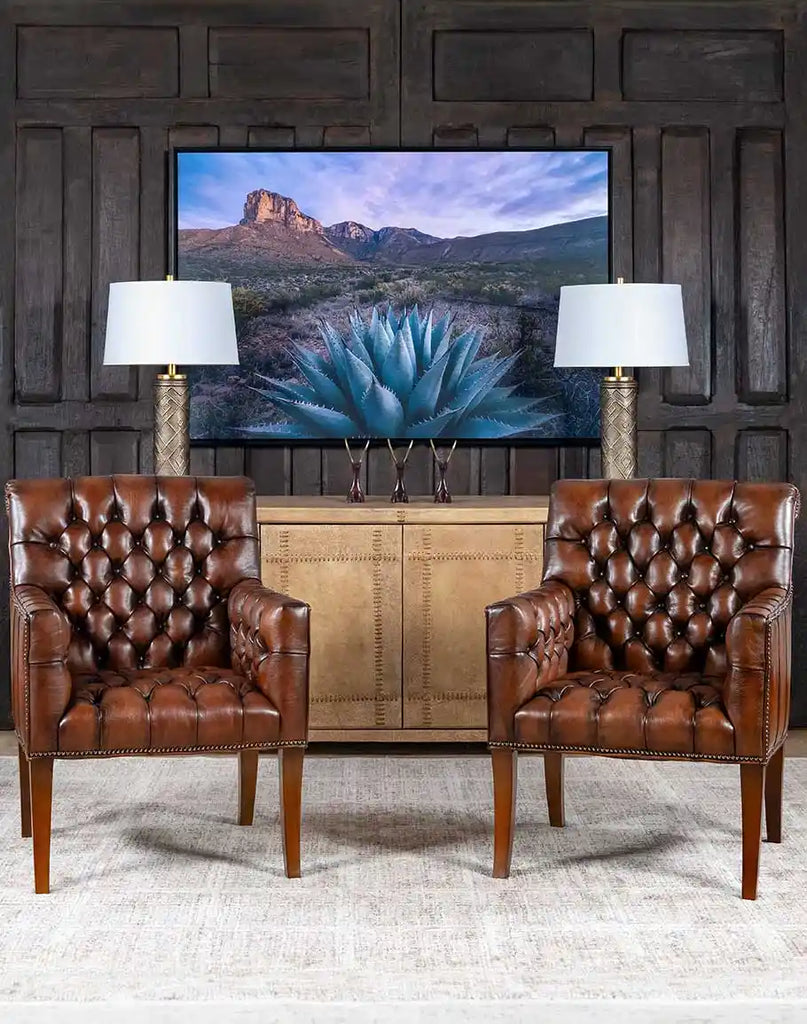 The Roan Sable Tufted Leather Chair placed in a refined living room setting, complementing classic and sophisticated décor.