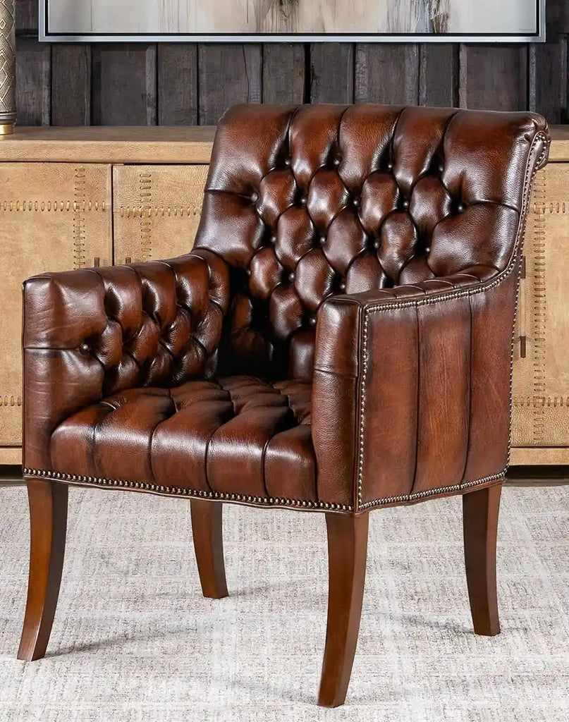 Roan Sable Tufted Leather Chair showcasing its deep button tufting and full-grain leather upholstery.