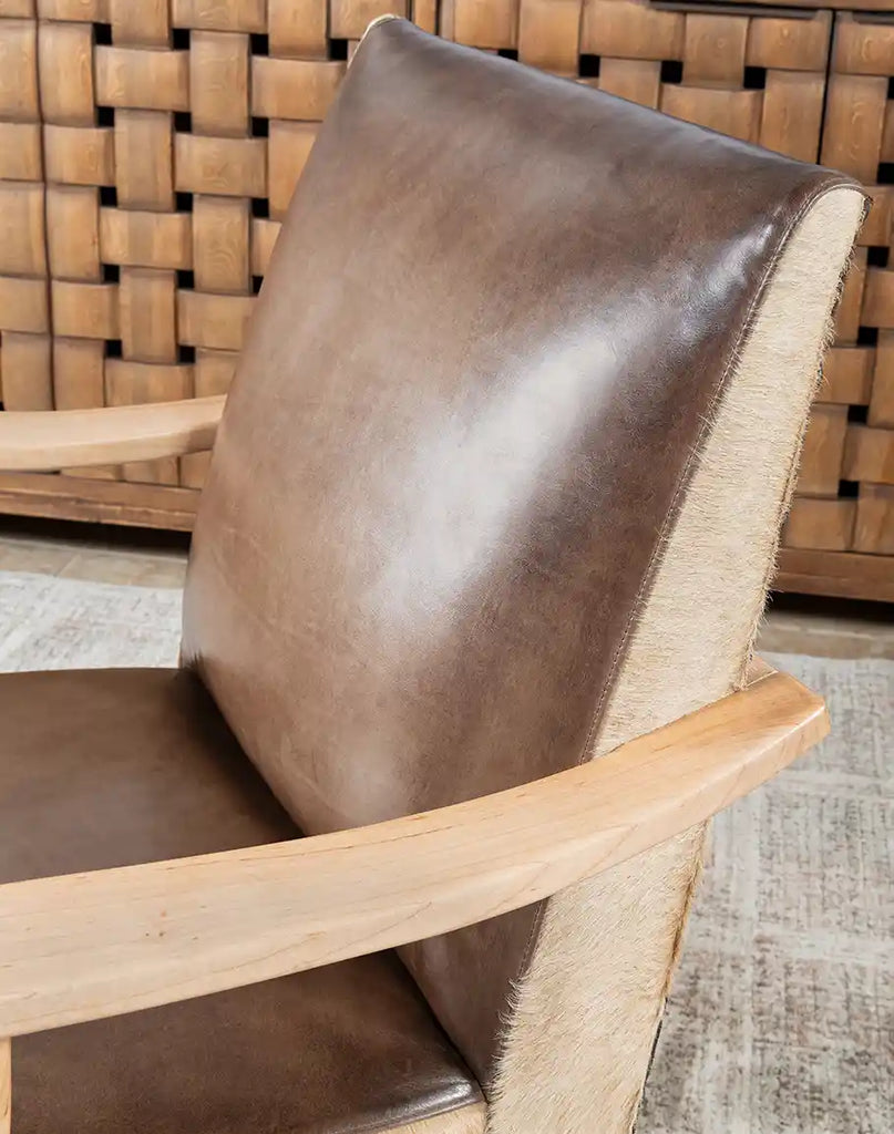 Robin Leather Chair emphasizing its plush seating and backrest.