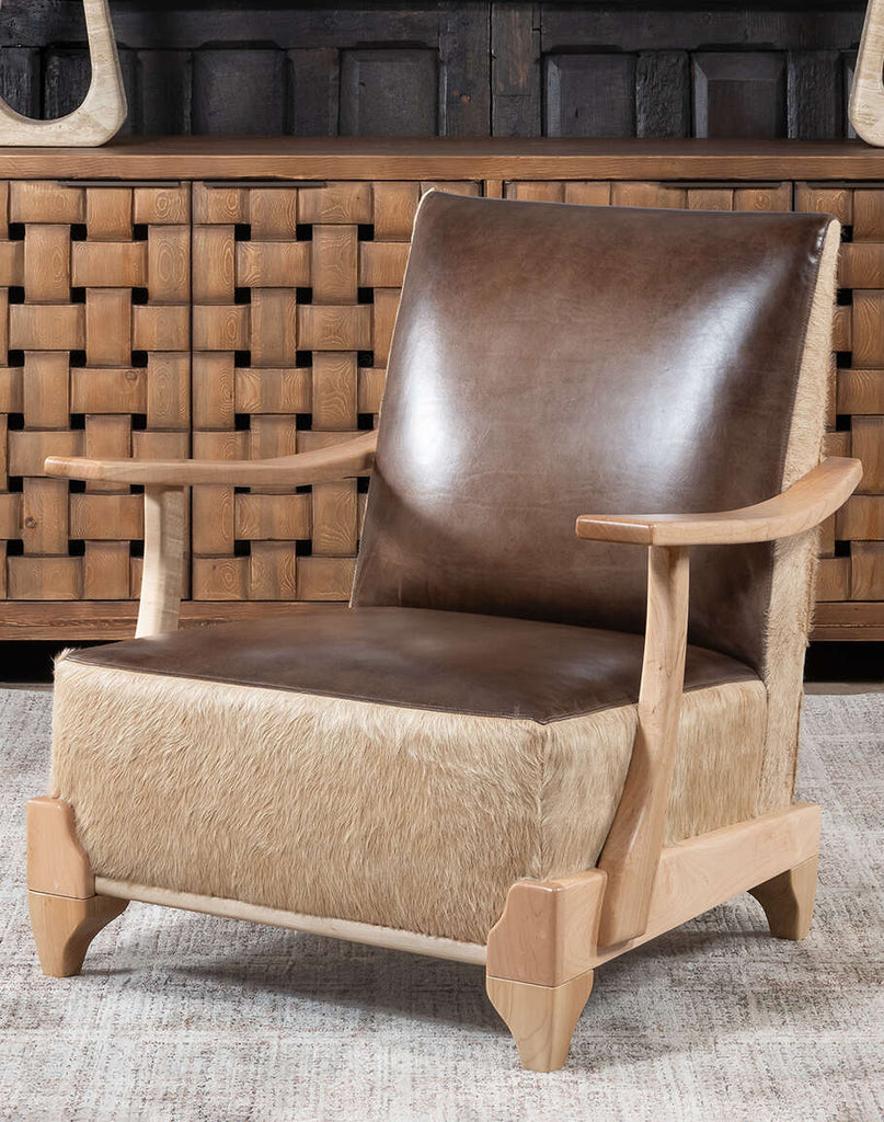 Front view of the Robin Leather Chair showcasing its sleek leather finish and detailed stitching.