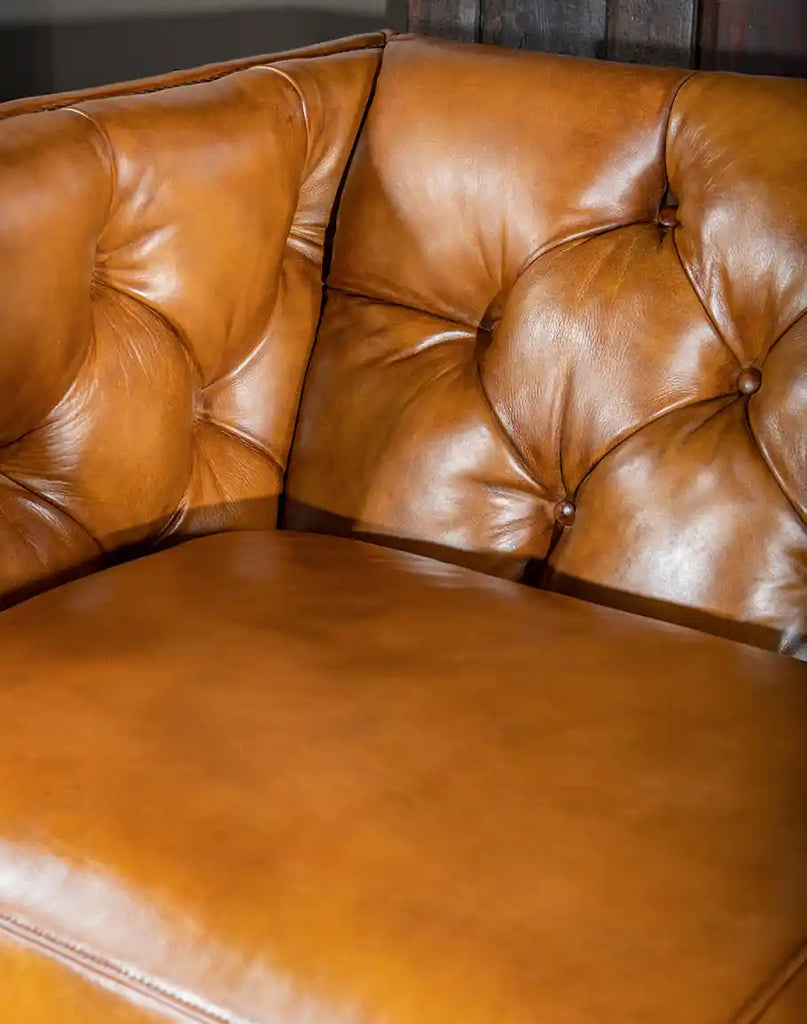 Detailed image of the Rochfort Chesterfield Sofa’s premium leather, showing its rich texture and durability.