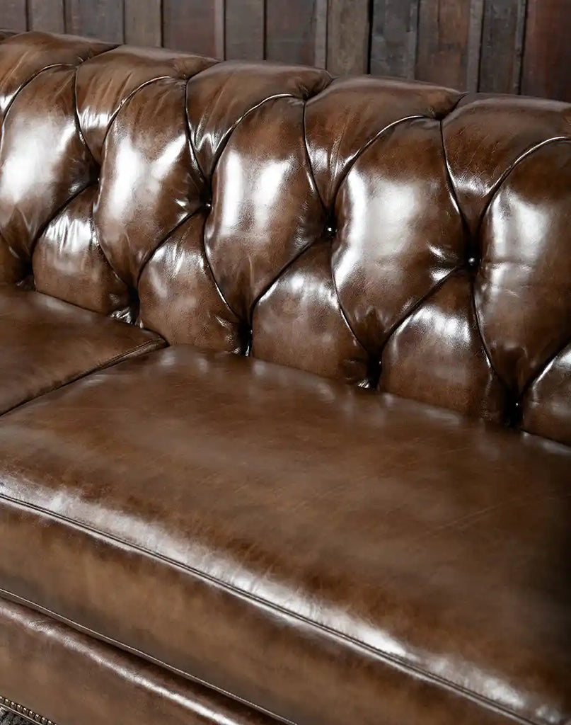 Close-up of the two medium-to-firm seat cushions on the Rockwood Smoked Chesterfield Sofa, offering comfort and support.