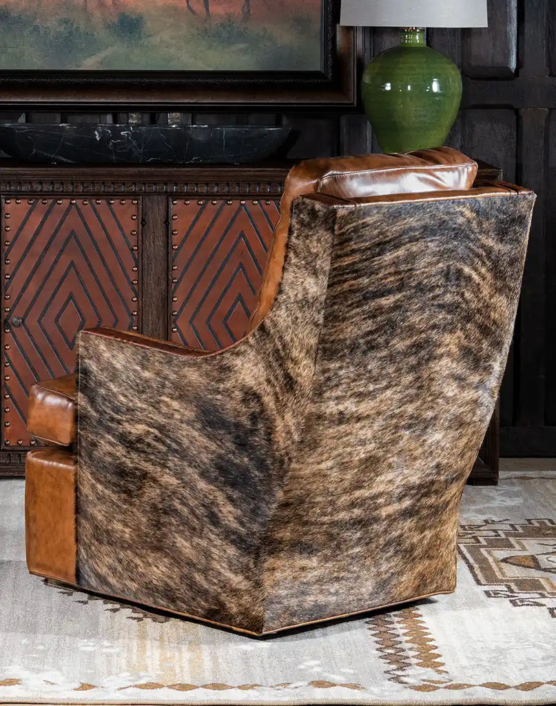 A rear view of the chair, displaying the smooth leather finish and sturdy construction.