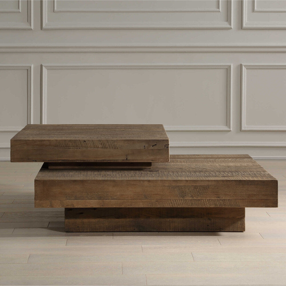 Reclaimed oak coffee table featuring distinctive wood grain and rustic hewn markings.