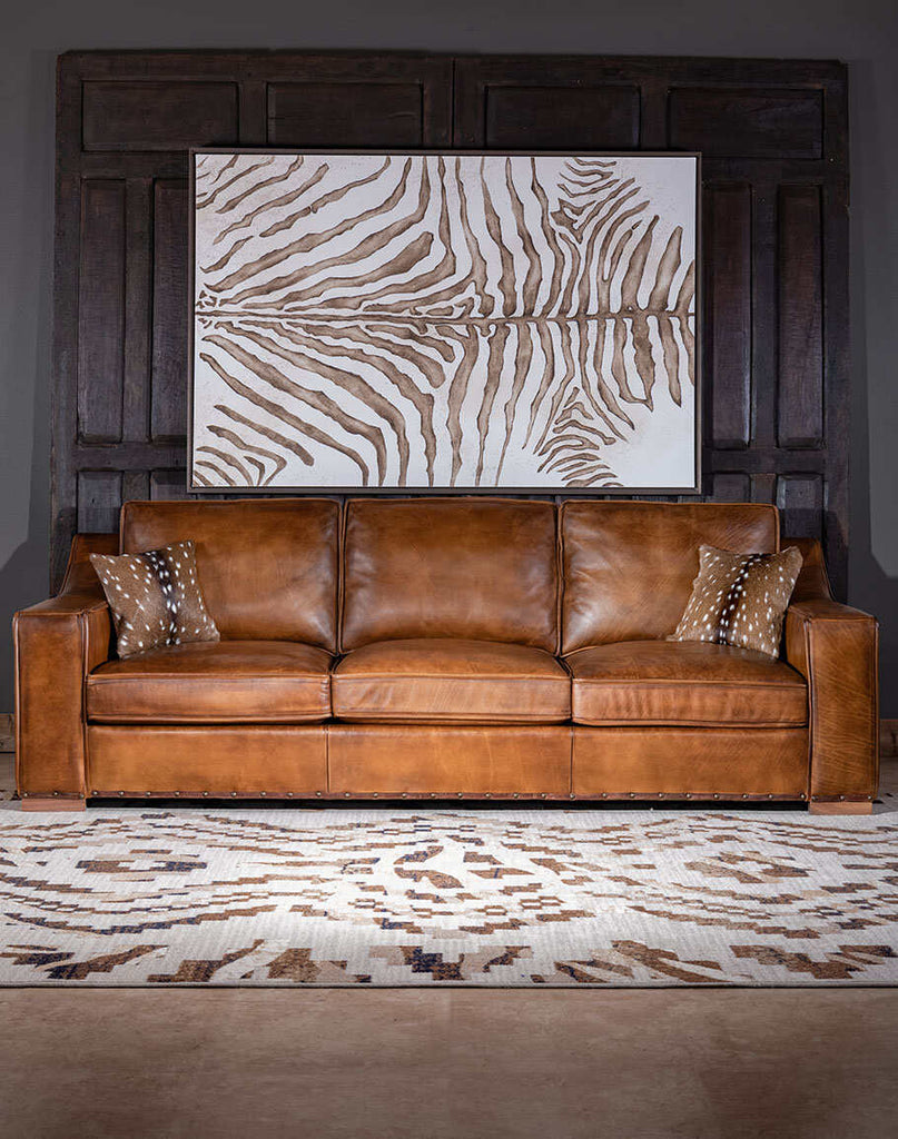 Ruby Cognac Leather Sofa showcasing its premium leather upholstery and sleek modern design.